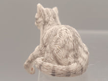 Load image into Gallery viewer, Resin Grey Striped Cat Laying with Paw Hanging
