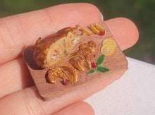 Load image into Gallery viewer, Duck roast with orange slices on board
