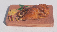 Load image into Gallery viewer, Duck roast with orange slices on board
