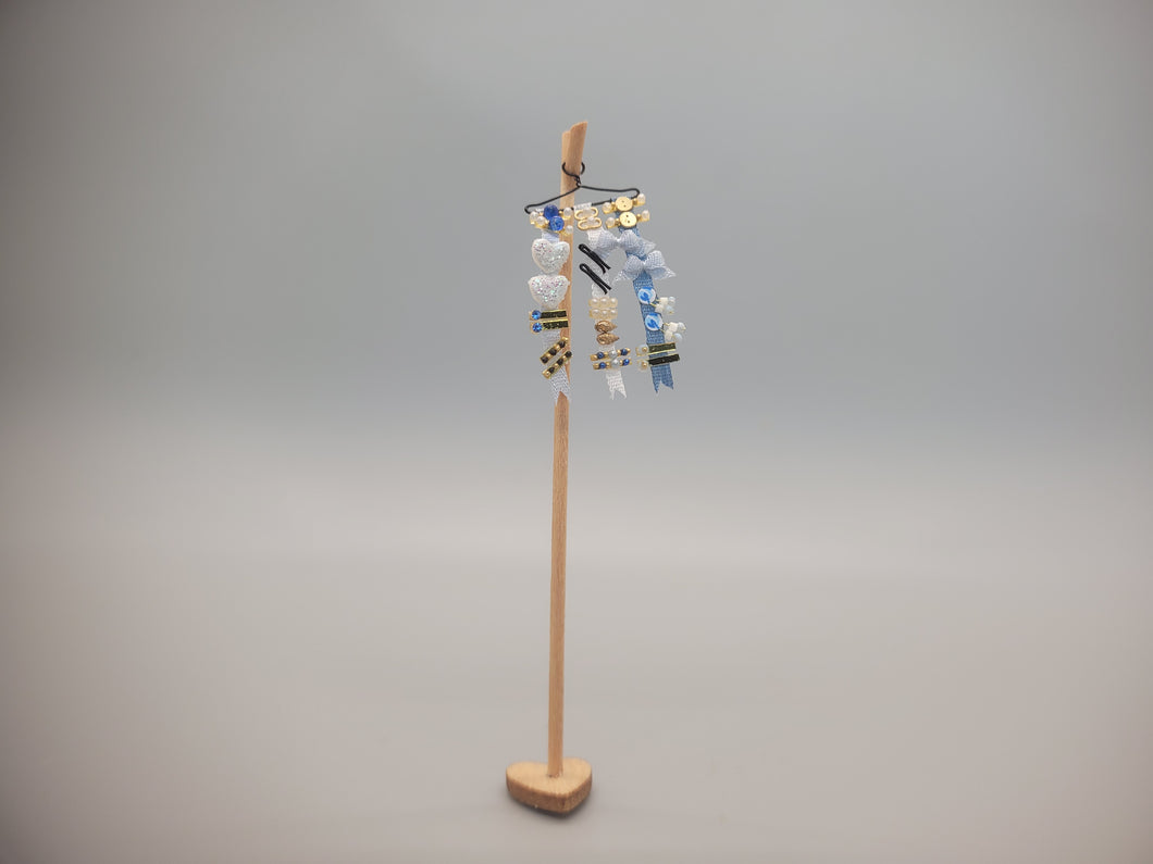 Blue Barrettes and Ribbons for Little Girl on Wooden Stand - by Cheryl Warder