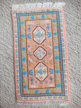 Load image into Gallery viewer, Dollhouse Miniature ~ Petit Point Pastel Pink and Blue Hieroglyphic-Style Rug - Ursula Sauerberg
