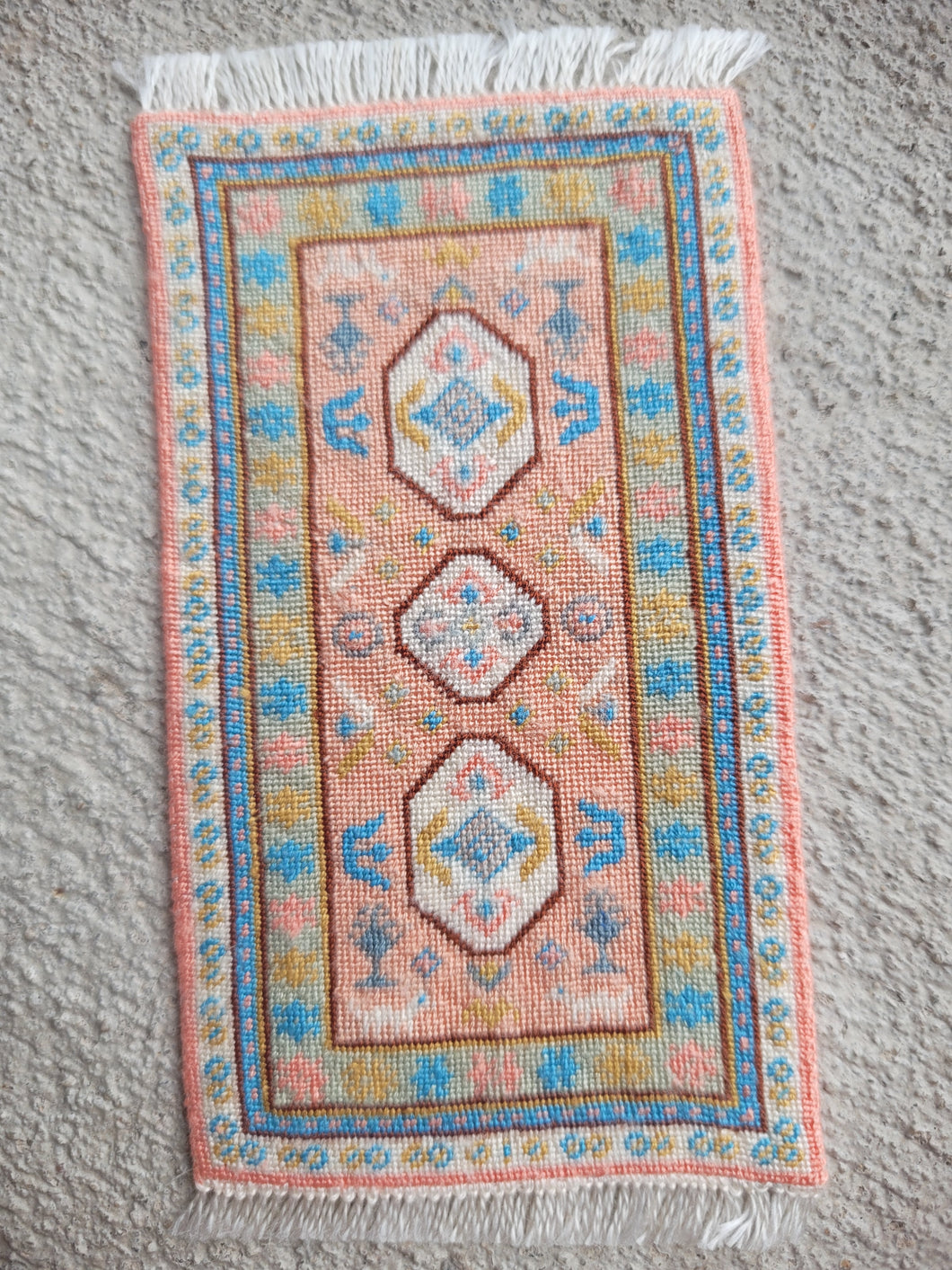 Dollhouse Miniature ~ Petit Point Pastel Pink and Blue Hieroglyphic-Style Rug - Ursula Sauerberg