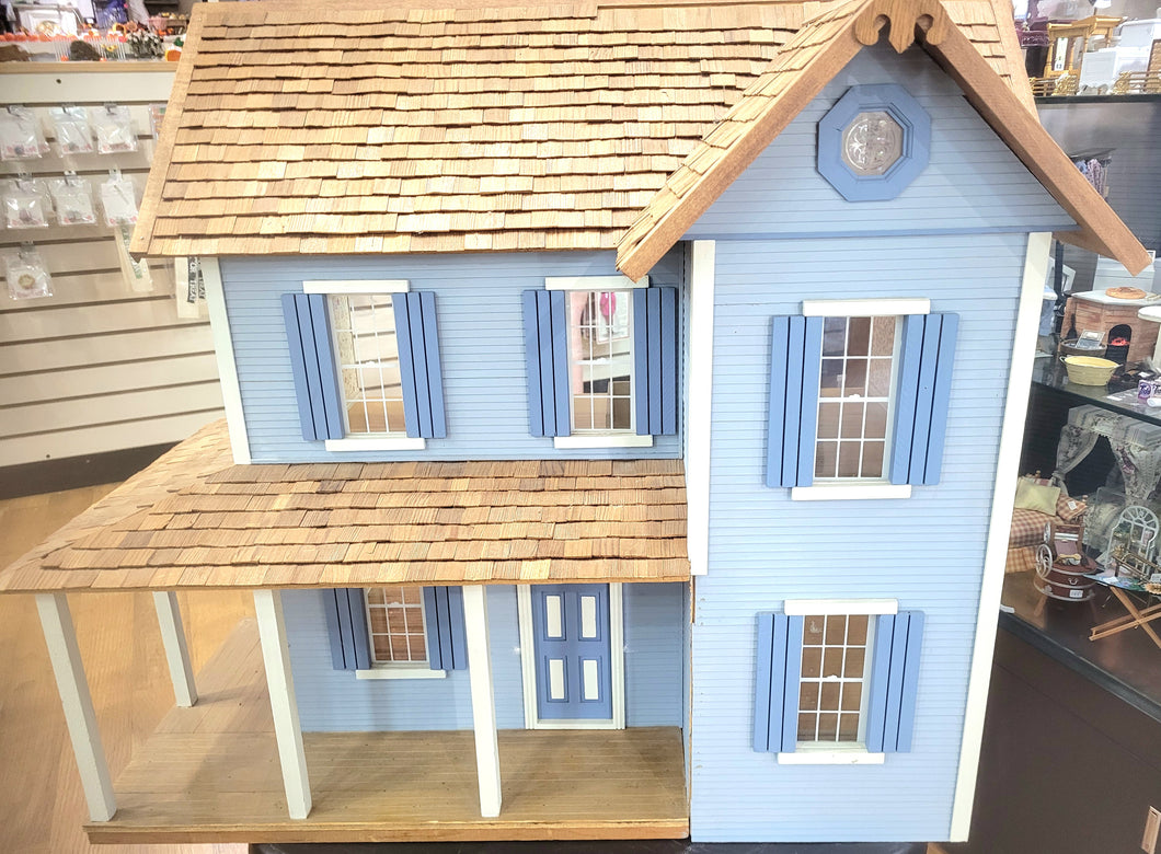 Blue Colonial Farmhouse with Porch