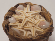 Load image into Gallery viewer, Tellin Shells and Starfish in Brown Woven Basket - 1&quot;
