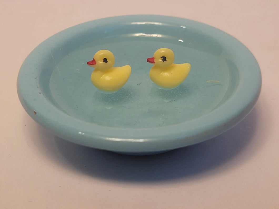 Rubber Ducks in Blue Wash Basin