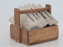 Load image into Gallery viewer, Al Chandronnait – Wooden Box Holding Fabric

