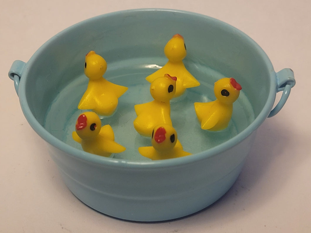 Chirping Ducklings in Blue Galvanized Tub