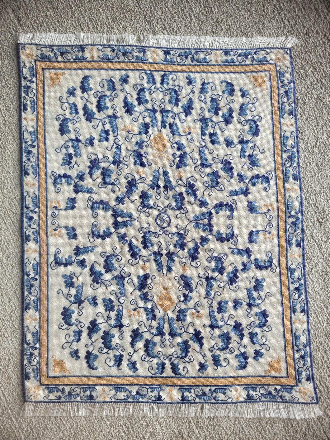Dollhouse Miniature ~ Petit Point Cream and Blue Floral Embellishments Rug with Fringe - Ursula Sauerberg