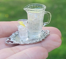 Load image into Gallery viewer, Lemon Ice Water on Metal Platter
