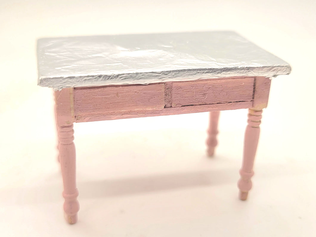 Foil-Covered Wooden Table