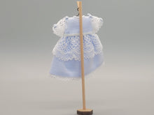 Load image into Gallery viewer, Blue Dress with White Lace Detailing on Wooden Stand - by Cheryl Warder
