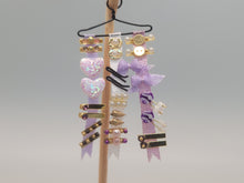 Load image into Gallery viewer, Purple Ribbons and Barrettes for Little Girl on Wooden Display – by Cheryl Warder
