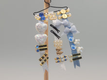Load image into Gallery viewer, Blue Barrettes and Ribbons for Little Girl on Wooden Stand - by Cheryl Warder
