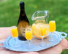 Load image into Gallery viewer, Mimosas with Champagne, Glass Pitcher, and Glass Flutes on Metal Platter
