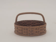 Load image into Gallery viewer, Al Chandronnait – Oval Woven Brown Basket with Handle Bar
