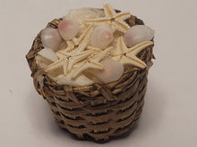 Load image into Gallery viewer, Real Starfish and Tellin Shells in Brown Woven Basket
