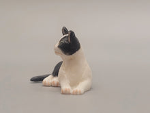 Load image into Gallery viewer, Resin Tuxedo Kitten Laying Down
