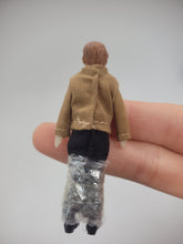 Load image into Gallery viewer, Dollhouse Miniature ~ ½&quot; Scale, Male Doll with Tan Shirt and Black Dress Pants
