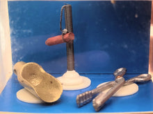 Load image into Gallery viewer, Dollhouse Miniature ~ 1:10 Scale, Dora Kuhn Cucumber Tongs &amp; Shovel in Original Packaging
