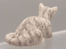 Load image into Gallery viewer, Resin Grey Striped Cat Laying with Paw Hanging
