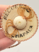 Load image into Gallery viewer, Dollhouse Miniature ~ 1:12 Scale, Tan Sombrero with &#39;Recuerdo Chapala&#39; On Brim
