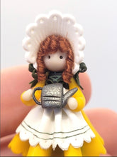Load image into Gallery viewer, Julie Stevens – Handmade Clay Sunflower Girl Holding Teapot
