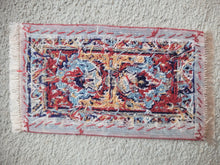 Load image into Gallery viewer, Dollhouse Miniature ~ Petit Point Tribal Rug with Mirrored Emblems and Geometric Border - Ursula Sauerberg
