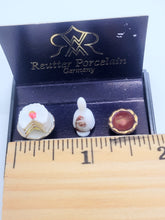 Load image into Gallery viewer, Dollhouse Miniature ~ Bell, Cake, and Bowl with Santa Image - Reutter Porcelain

