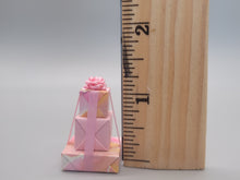 Load image into Gallery viewer, 3 Tier Presents Wrapped in Pink and Yellow Paper with Pink Bow
