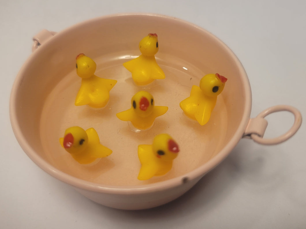 Chirping Ducklings in Galvanized Bucket