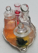 Load image into Gallery viewer, Potions and Frog in Glass Jar on Metal Platter
